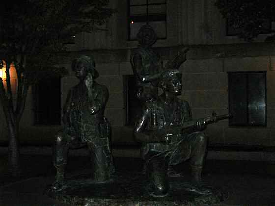 Dimly lit statue of soldiers