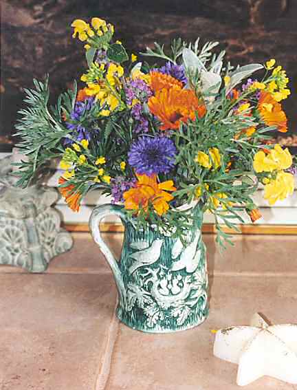 Freesia, wormwood, scabiosa, calendula, jerusalem sage, lamb's ear